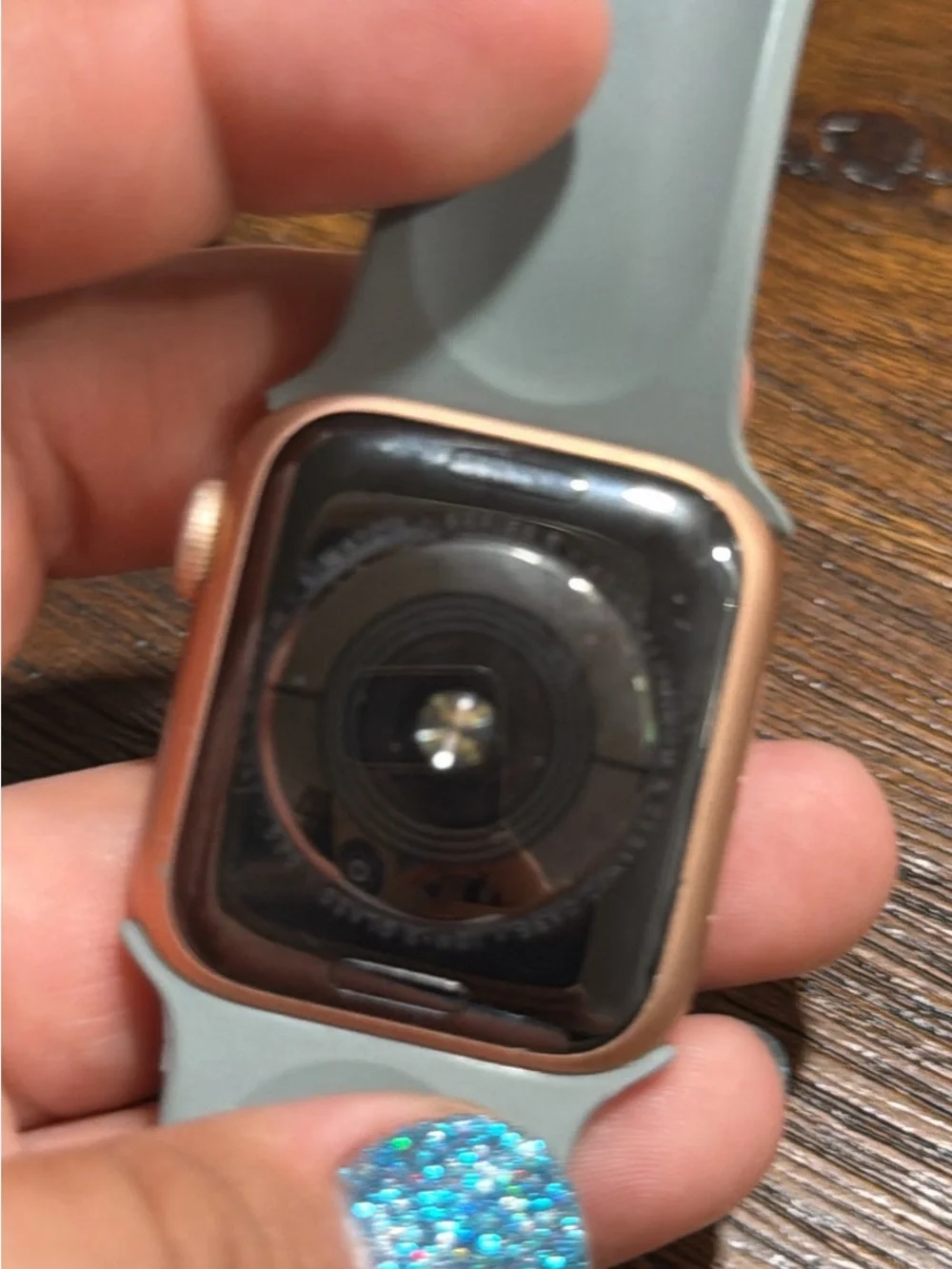 Apple Smartwatch with Pale Blue Silicone Band and Rose Gold Case